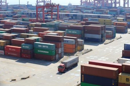 FILE PHOTO: Containers are seen at the Yangshan Deep Water Port, part of the Shanghai Free Trade Zone, in Shanghai, China February 13, 2017. REUTERS/Aly Song