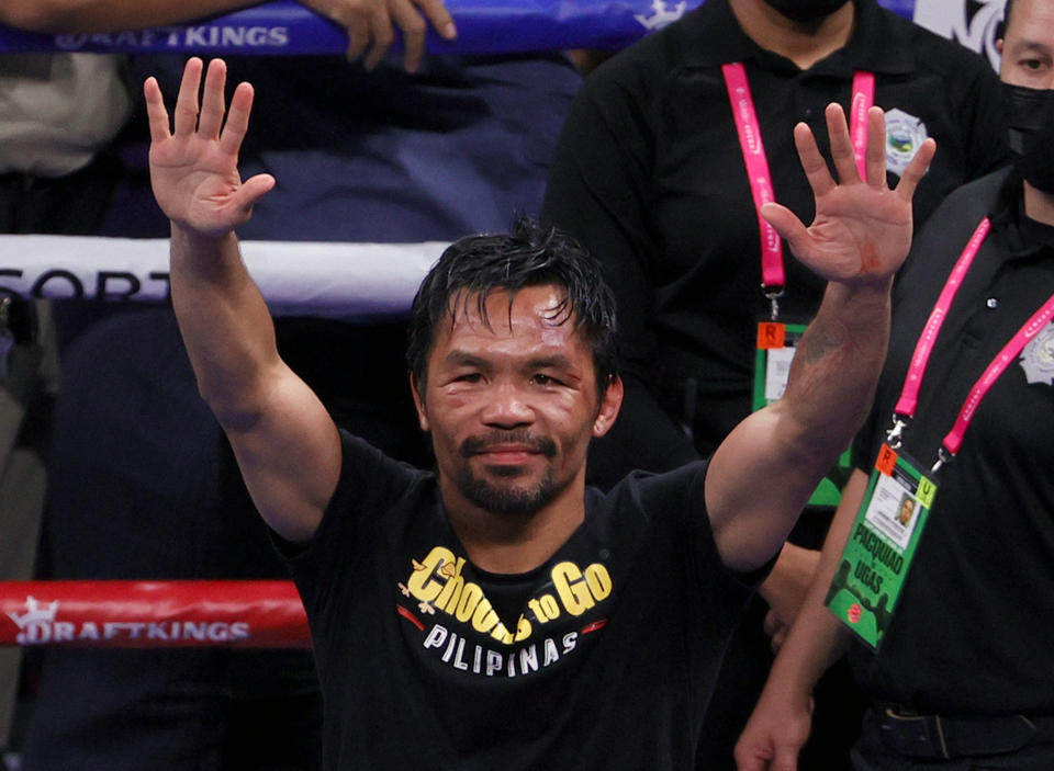 LAS VEGAS, NEVADA - AUGUST 21:  Manny Pacquiao gestures to fans after his WBA welterweight title fight against Yordenis Ugas at T-Mobile Arena on August 21, 2021 in Las Vegas, Nevada. Ugas retained his title by unanimous decision.  (Photo by Ethan Miller/Getty Images)