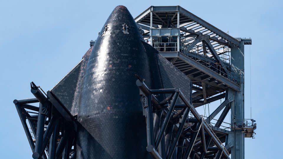 SpaceX's first orbital Starship SN20 is shown here stacked atop its massive Super Heavy Booster 4 at the company's Starbase facility near Boca Chica Village in South Texas on February 10, 2022. - Jim Watson/AFP/Getty Images