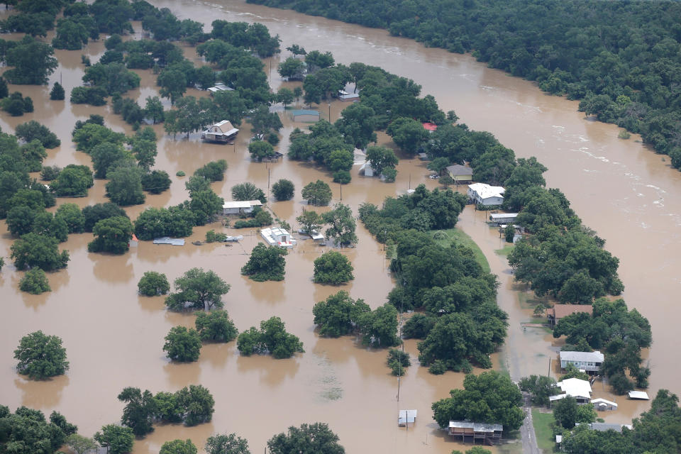 Swollen river feeds Texas flooding