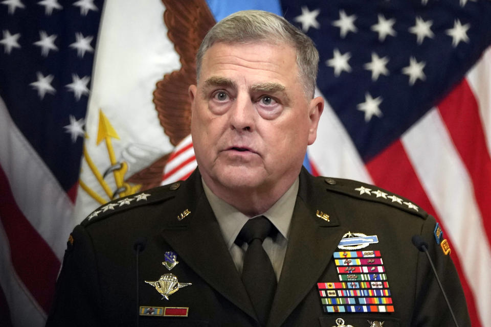 FILE - Chairman of the Joint Chiefs of Staff U.S. General Mark Milley addresses the media during a meeting of NATO defense ministers, at NATO headquarters in Brussels, June 15, 2023. In Quotes of the Year, a Yale Law School librarian's list of the most notable quotes of 2023, Miller is quoted: "We don't take an oath to a wannabe dictator ... We take an oath to the Constitution," at a farewell ceremony, Sept. 29, 2023. (AP Photo/Virginia Mayo, File)