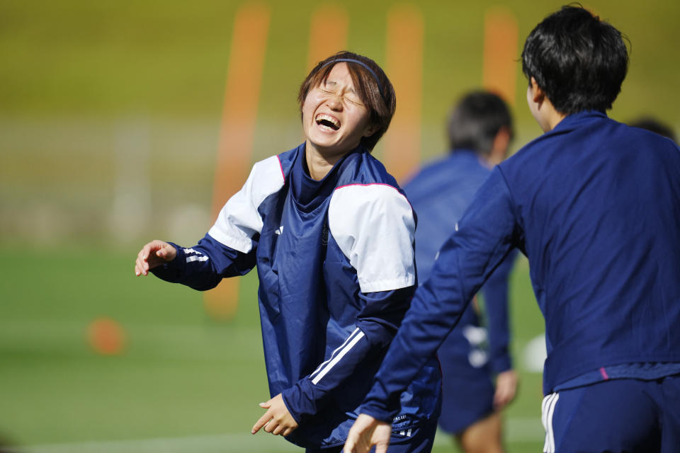 Japan's Hinata Miyazawa, left, laughs during a training session ahead of the FIFA Women's World Cup quarterfinal soccer match between Japan and Sweden in Auckland, New Zealand, Thursday, Aug. 10, 2023. (AP Photo/Abbie Parr)