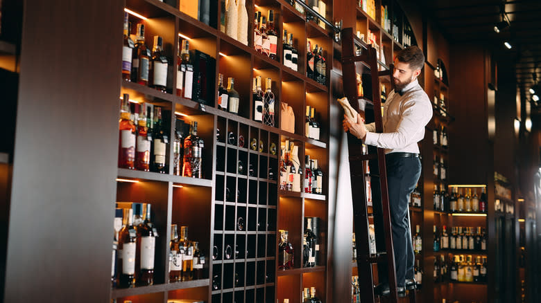 Liquor store shelves with bottles