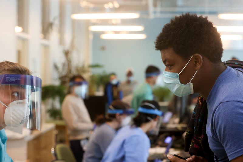 Clients are seen for a free walk-in coronavirus test at the Bread for the City social services charity during the coronavirus disease (COVID-19) outbreak, in Washington