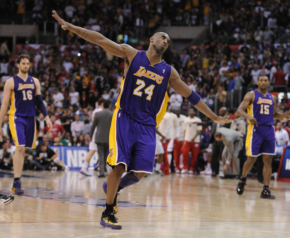 Lakers guard Kobe Bryant celebrates a basket against the Clippers late in the fourth quarter during a 113-108 win at Staples Center on April 4. (Photo by Harry How/Getty Images)
