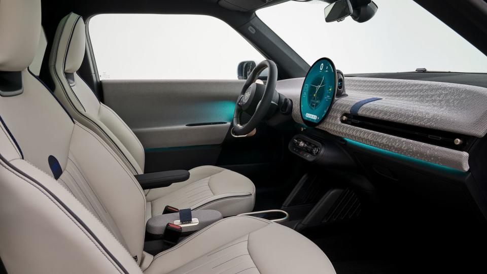 2025 mini cooper electric lineup in ocean blue with white interior