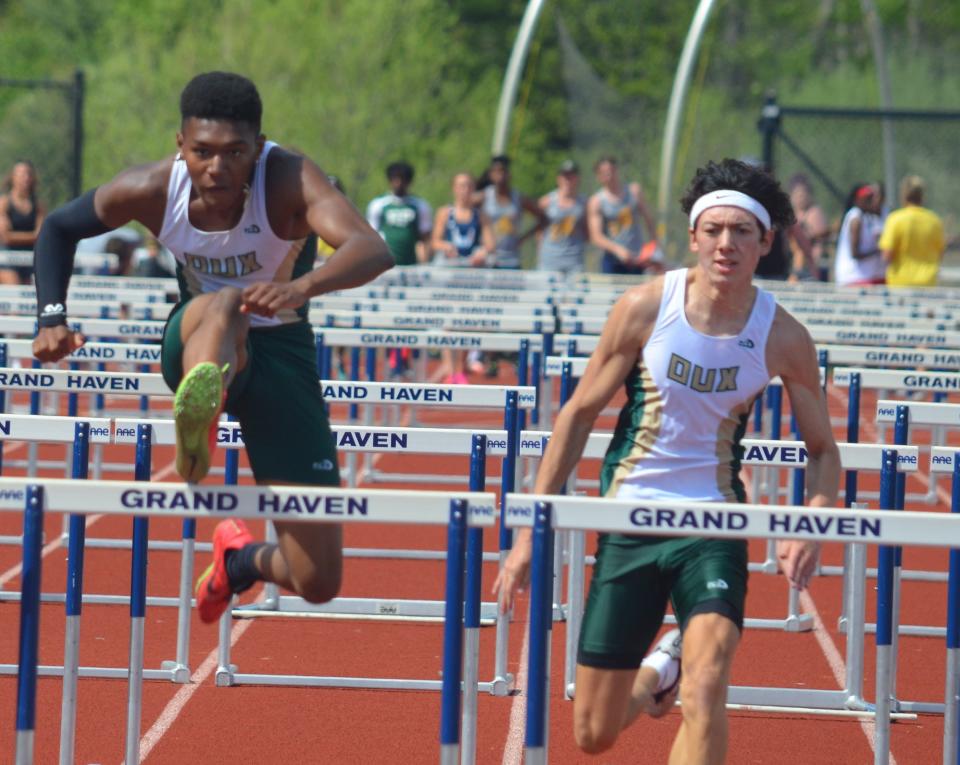 Ethan Brooks (left) qualified for the state meet in both hurdle events.