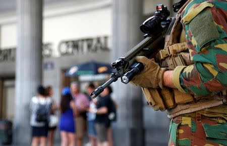 A Belgian soldier stands guard outside Brussels central railway station after a suicide bomber was shot dead by troops in Brussels, Belgium, June 21, 2017. REUTERS/Francois Lenoir