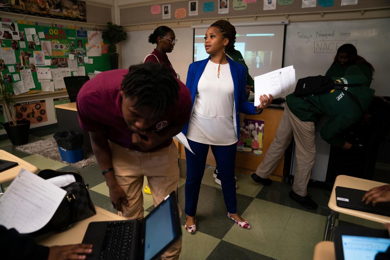 Science department chair Samantha Koonce Gaines, directs students at the Thurgood Marshall Academy Public Charter High School following the physics class taught virtually.