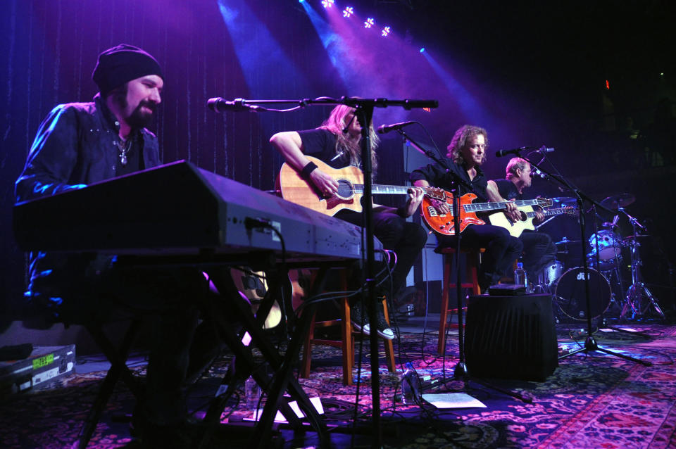 This March 26, 2013 photo shows the band Night Ranger performing during a grand opening week concert at the Brennan Rock & Roll Academy in Sioux Falls, S.D. The center will give Boys & Girls Clubs members a chance to learn guitar, bass, drums, keyboards and vocals. (AP Photo/Dirk Lammers)