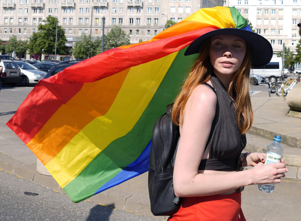 A woman take part in the Equality Parade, the largest gay pride parade in central and eastern Europe, in Warsaw, Poland, Saturday June 19, 2021. The event has returned this year after a pandemic-induced break last year and amid a backlash in Poland and Hungary against LGBT rights.(AP Photo/Czarek Sokolowski)