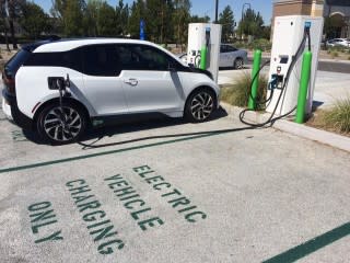 BMW i3 electric car charging in 'EV Charging Only' space, Santa Clarita, CA [photo: Steve J. Myung]