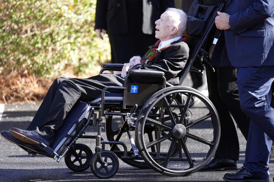 FILE - Former President Jimmy Carter departs after attending the funeral service for his wife, former first lady Rosalynn Carter, at Maranatha Baptist Church, in Plains, Ga., Nov. 29, 2023. In the year since Jimmy Carter first entered home hospice care, the 39th president has celebrated his 99th birthday, enjoyed tributes to his legacy and outlived his wife of 77 years. Rosalynn Carter, who died in November after suffering from dementia, spent just a few days under hospice. (AP Photo/John Bazemore, File)