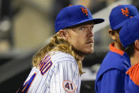 New York Mets' Noah Syndergaard watches his team play during the fifth inning of a baseball game against the Chicago Cubs Wednesday, June 16, 2021, in New York. (AP Photo/Frank Franklin II)