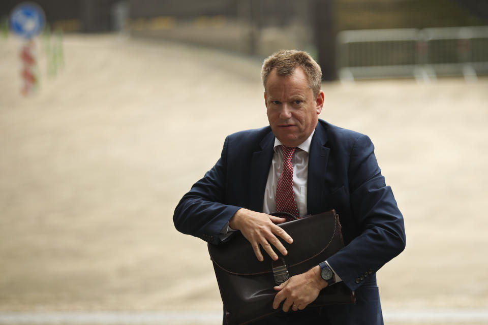 United Kingdom's Brexit advisor David Frost arrives at EU headquarters for a technical meeting on Brexit, in Brussels, Monday, Oct. 7, 2019. The EU's executive Commission said that Johnson needs to rid himself of all elements in his proposal that are based on untried and revocable arrangements that would spill over into a transition period after a deal is found. (AP Photo/Francisco Seco)