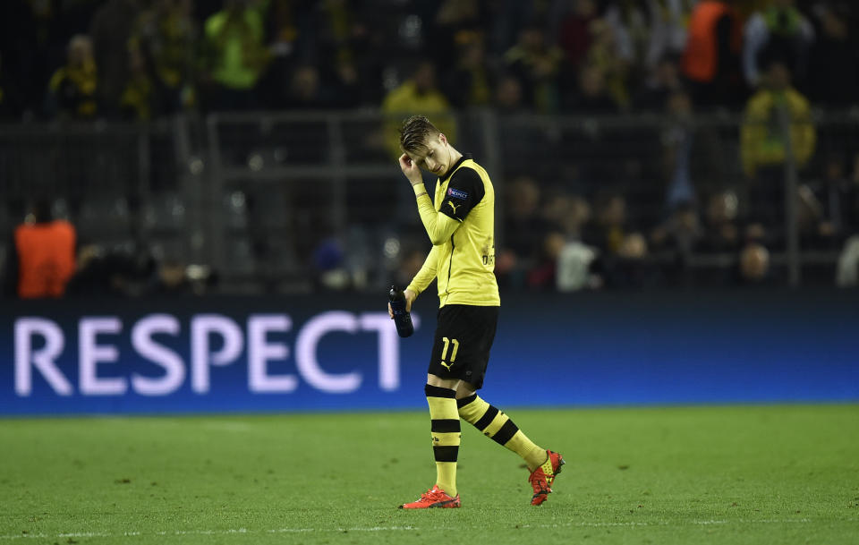 Dortmund's Marco Reus leaves at the end of the Champions League quarterfinal second leg soccer match between Borussia Dortmund and Real Madrid in the Signal Iduna stadium in Dortmund, Germany, Tuesday, April 8, 2014. (AP Photo/Martin Meissner)