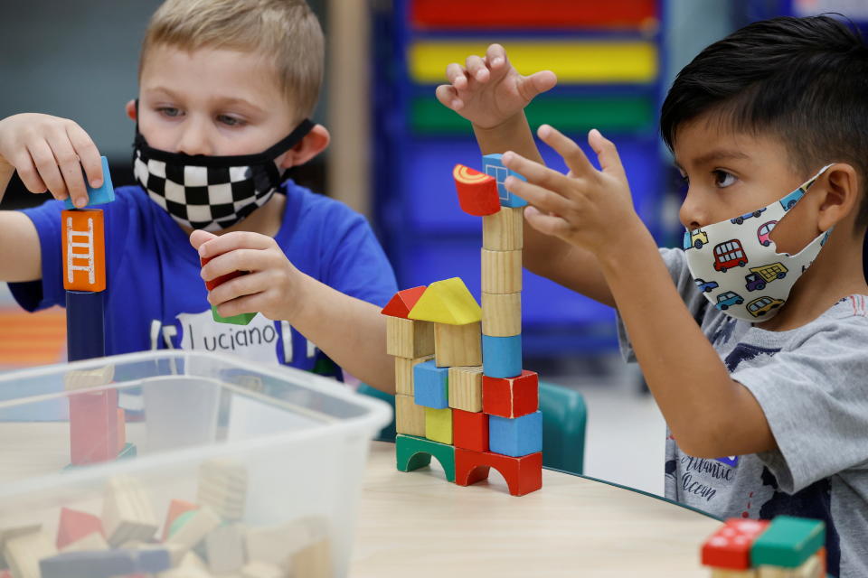 Children wear masks at school.