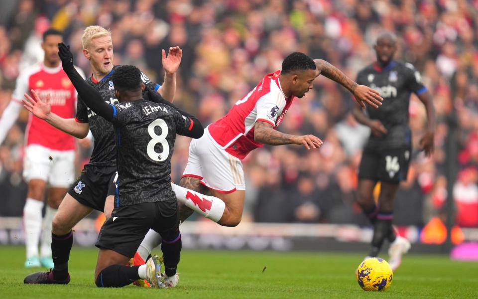 Arsenal's Gabriel Jesus, centre, in action during the English Premier League soccer match between Arsenal and Crystal Palace at Emirates Stadium in London, Saturday, Jan. 20,