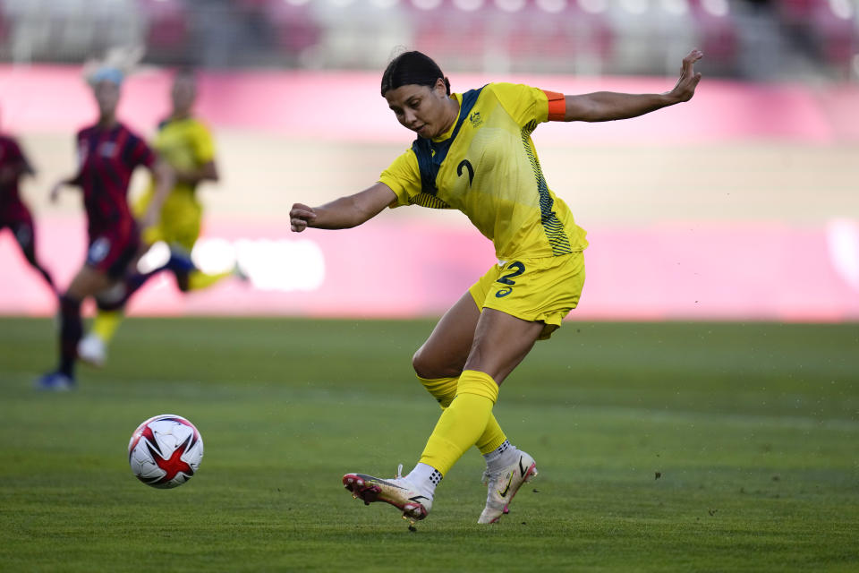 Australia's Sam Kerr scores her side's first goal against United States during the women's bronze medal soccer match at the 2020 Summer Olympics, Thursday, Aug. 5, 2021, in Kashima, Japan. (AP Photo/Fernando Vergara)