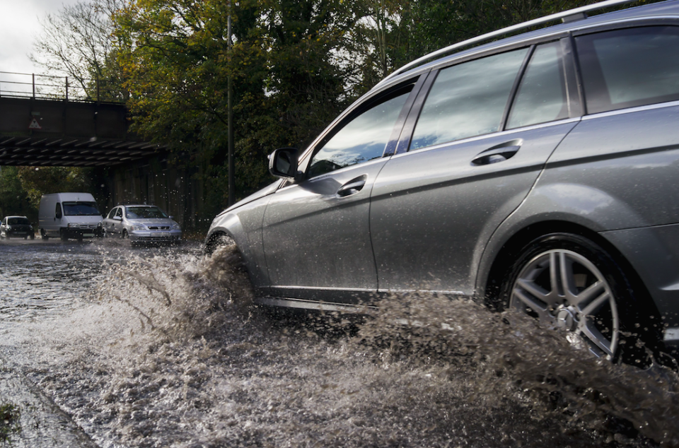 <em>It is an offence to drive through a puddle causing pedestrians to be splashed (Rex/stock photo)</em>