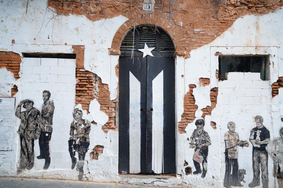 These travel advisories are the best resources for potential travelers of Puerto Rico to stay informed. 
pictured: the iconic door of San Juan on the side of the street 