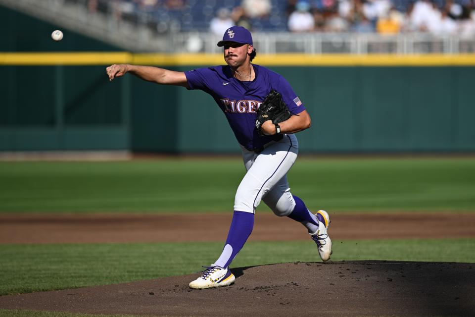 Jun 22, 2023; Omaha, NE, USA;  LSU Tigers starting pitcher Paul Skenes (20) throws against the Wake Forest Demon Deacons in the first inning at Charles Schwab Field Omaha. Mandatory Credit: Steven Branscombe-USA TODAY Sports