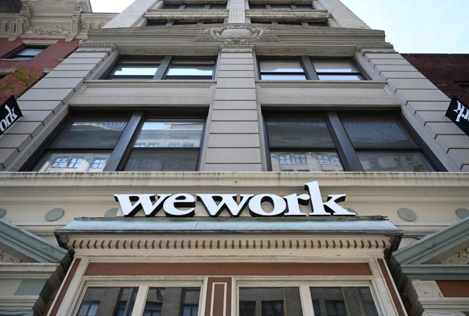 A WeWork office is seen in New York City on July 19, 2019. - With its free coffee, couches and glass partitions, shared workspace startup WeWork has shaken up both office culture and commercial real estate. Brushing aside questions about its business model, the New York outfit shows no signs of slowing down and is now preparing for its Wall Street debut to raise fresh capital. (Photo by TIMOTHY A. CLARY / AFP)        (Photo credit should read TIMOTHY A. CLARY/AFP/Getty Images)
