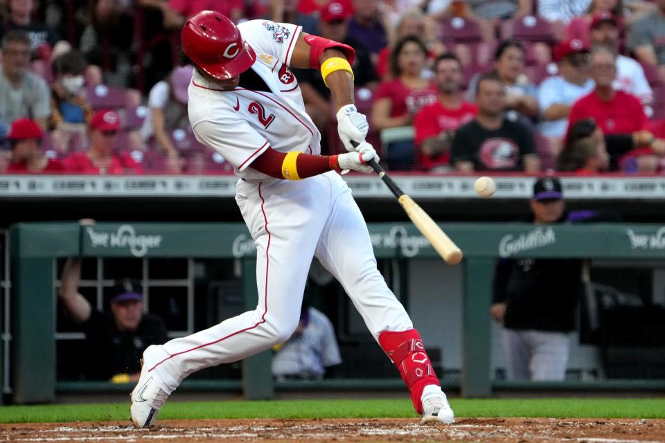 Cincinnati Reds shortstop Jose Barrero (2) hits a single during the second inning of a baseball game against the Colorado Rockies, Friday, Sept. 2, 2022, at Great American Ball Park in Cincinnati. 