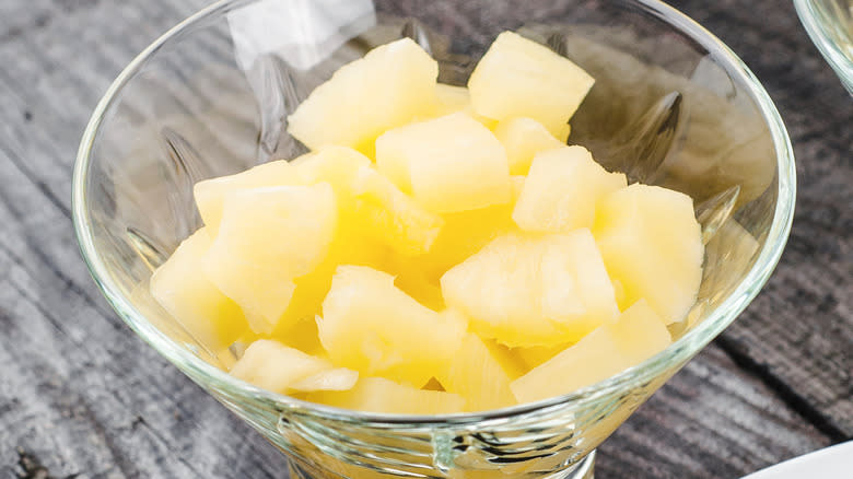 Pineapple chunks in glass bowl