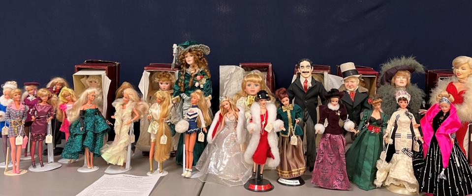 Barbie dolls and collectible dolls from the Danbury Mint were donated to the Center for Active Adults in South Lyon. The center will auction these dolls, as well as a collection of more than 300 dolls from around the world, in February.