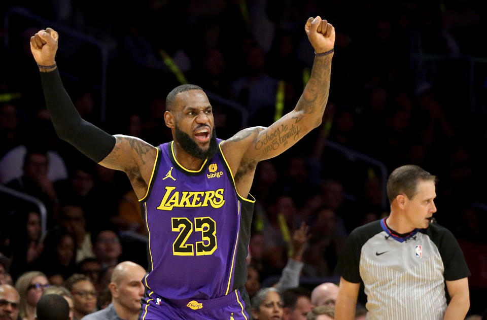 Los Angeles, CA - Lakers star LeBron James celebrates after hitiing the second of his three first quarter three-pointers against the Grizzles at Crypto.com Arena in Los Angeles on Friday night, Jan. 5, 2024. Luis Sinco / Los Angeles Times via Getty Images)
