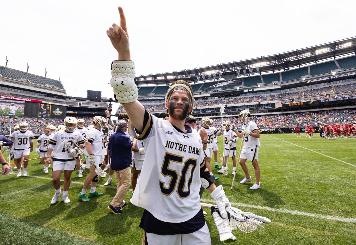 Notre Dame's Chris Kavanagh celebrates after a semifinal victory against Denver.