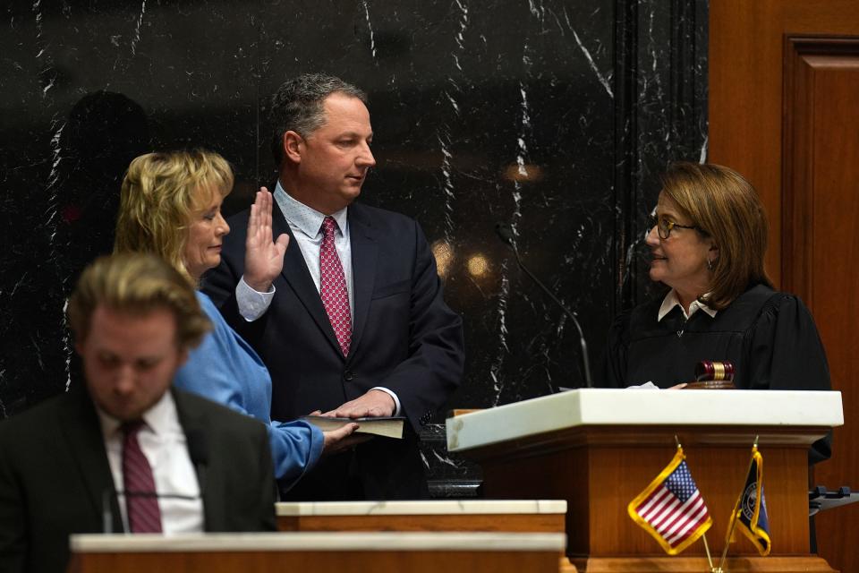 Indiana House Speaker Todd Huston is sworn in by the Hon. Loretta Rush on Tuesday, Nov. 22, 2022, during the ceremonial start of the upcoming legislative session at the Statehouse in Indianapolis. The session starts in earnest on Jan. 9, 2023. 