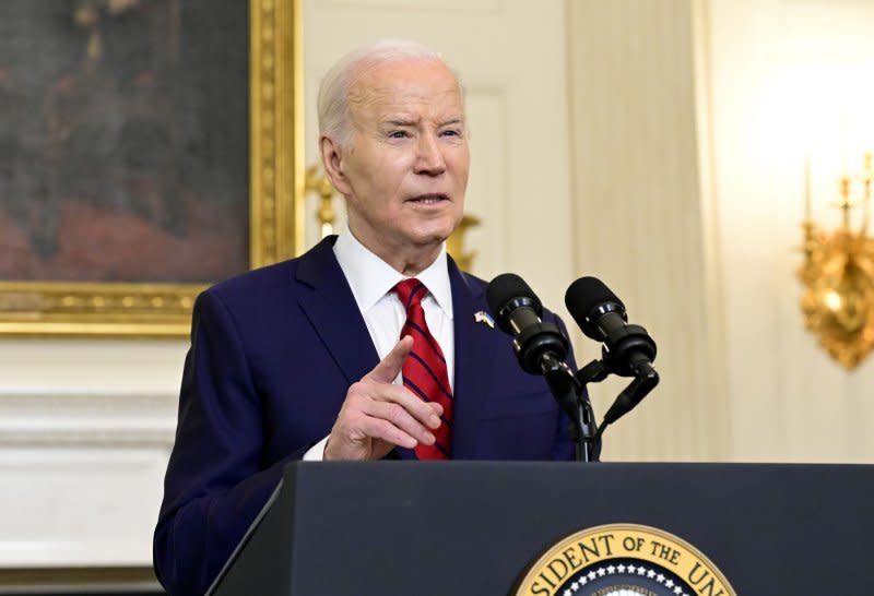 President Joe Biden remarks to media after signing the $95 billion National Security Package that includes military aid to Ukraine and Israel and provides funding for humanitarian aid to Gaza in the State Dining Room of the White House on Wednesday. Photo by Ron Sachs/UPI