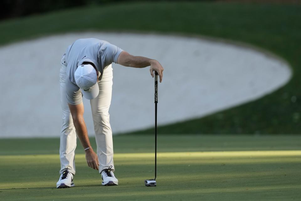 Rory McIlroy, of Northern Ireland, reacts after missing a putt on the 13th hole during second round at the Masters golf tournament at Augusta National Golf Club Friday, April 12, 2024, in Augusta, Ga. (AP Photo/David J. Phillip)