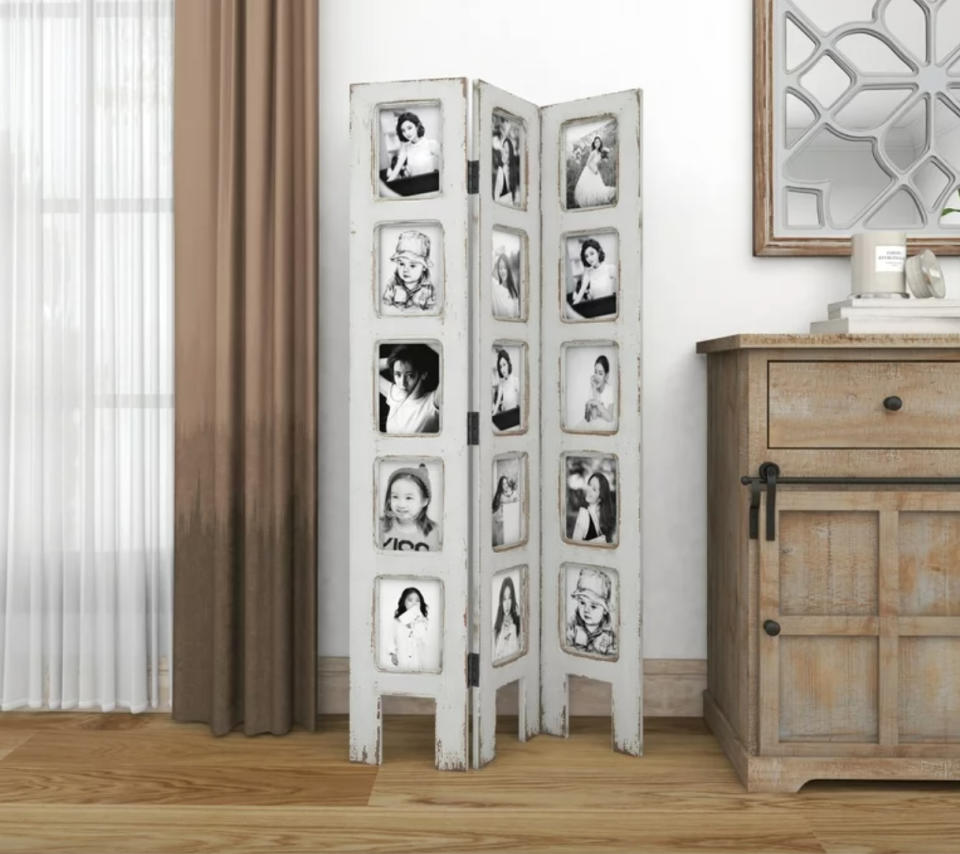 White wood 3-panel room divider with 15 photo slots