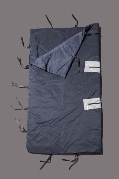 <p>But more importantly, it expands to form a sleeping bag or blanket. <i>[Photo: Jessica Richmond]</i></p>