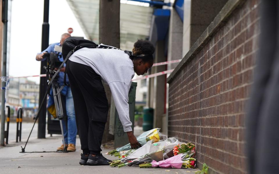 Flowers left near the scene of the stabbing