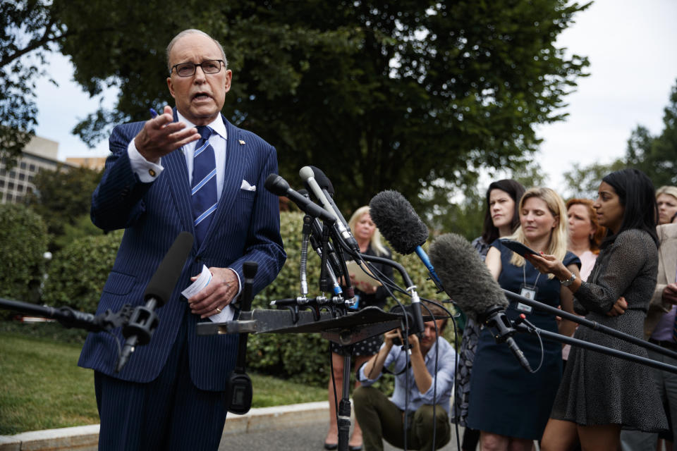 White House chief economic adviser Larry Kudlow talks to reporters outside the White House, Friday, Aug. 2, 2019, in Washington. (AP Photo/Evan Vucci)