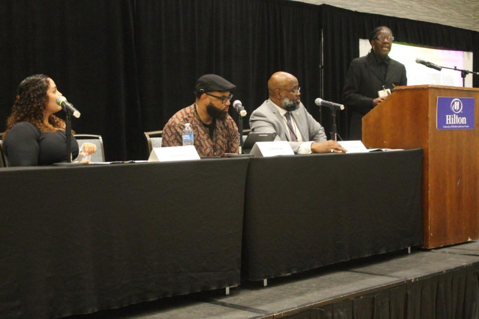 Rik Stevenson, right, speaks during the "Teaching Black While Living In The Red: African-American Studies at the University of Florida" session of the 47th Annual National Council for Black Studies Conference on Saturday. He is joined from left by panelists Alyssa Cole, Ph.D., Drew Brown, Ph.D., and moderator David Canton, Ph.D., director of the African American Studies Program at UF, which hosted the conference.
(Photo: Photo by Voleer Thomas/For The Guardian)
