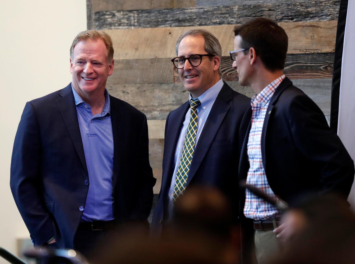 NFL Commissioner Roger Goodell, left, speaks with Brown County Executive Troy Streckenbach and Aaron Popkey, Green Bay Packers director of public affairs, during a promotional event for the 2025 NFL Draft at Johnsonville Tailgate Village on Aug. 14, 2023, in Green Bay, Wis.