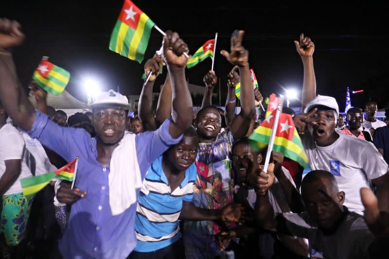 Supporters of President Faure Gnassingbe ,Presidential candidate of UNIR (Union for the Republic) and winner of the presidential election celabrate at their headquarters in Lome, Togo