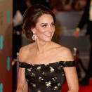 It's nearly BAFTA time again so get ready for all those show-stopping gowns, dazzling jewels and high heel heaven. The red carpet is all about A-listers' outfit choices, but don't forget some of our favourite royals often attend too, giving us a double hit of glamour. The Duchess of Cambridge has graced the BAFTAs twice over the years, in 2017 and 2018, as well as popping into the BAFTA Brits to Watch event way back in 2011. All of her outfits have been stunning, so as 2019 ceremony draws near, we decided to relive Kate's past BAFTA looks – the designer dresses, jewellery, shoes and bags. Enjoy! The Duchess wore this breath-taking black patterned off-the-shoulder gown by Alexander McQueen to the 2017 BAFTAs. Didn't she look amazing? The dress featured a Bardot neckline, bodice and full-length skirt with stylish ribbon detailing.