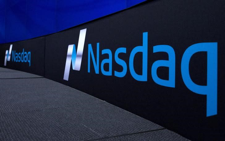 FILE PHOTO: The Nasdaq logo is displayed at the Nasdaq Market site in New York September 2, 2015. REUTERS/Brendan McDermid/File Photo