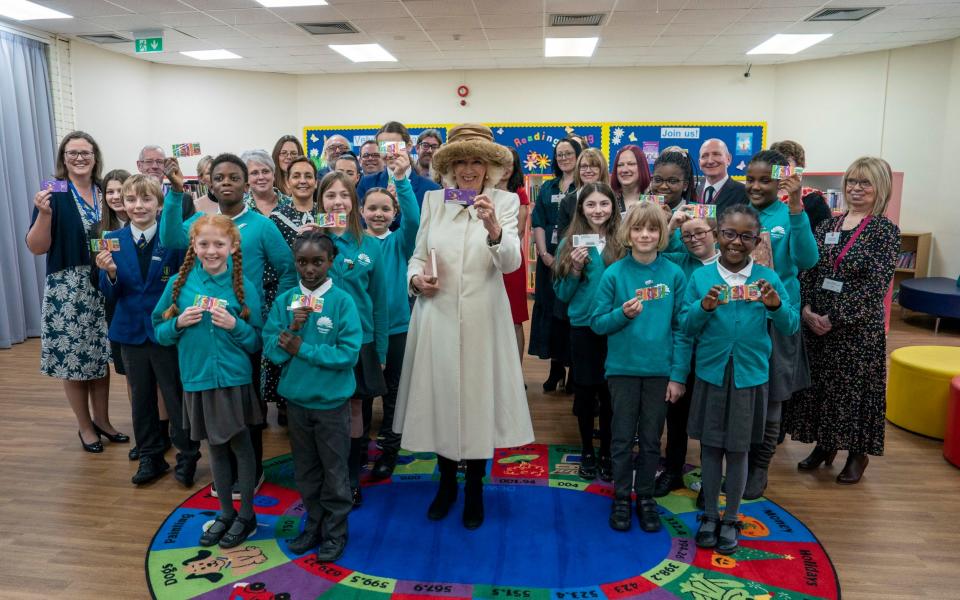 The Queen Consort with her Essex library card - Arthur Edwards/The Sun/PA