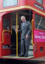 LONDON, ENGLAND - NOVEMBER 01: Prince Charles, Prince of Wales poses on a routemaster bus as he meets ambassadors and collectors on board the London Poppy Day red bus at Clarence House on November 01, 2012 in London, England. (Photo by Anthony Devlin - WPA Pool/Getty Images)