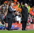 Liverpool's manager Brendan Rodgers, left and Manchester United's manager Alex Ferguson during an English Premier League soccer match between Manchester United and Liverpool at Anfield in Liverpool, England, Sunday Sept. 23, 2012. (AP Photo/Clint Hughes)