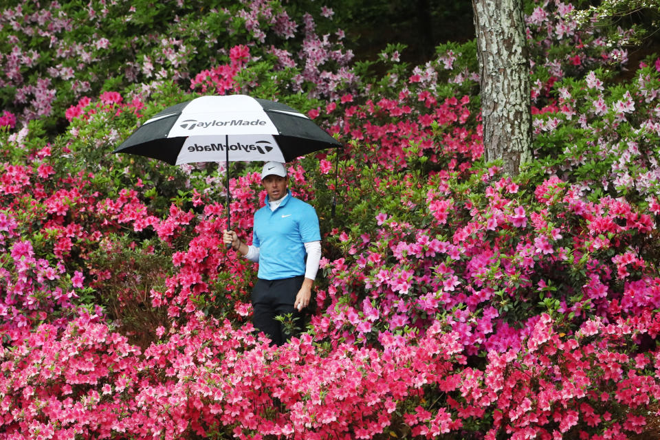 <p>AUGUSTA, GA – APRIL 07: Rory McIlroy of Northern Ireland locates his ball in the flowers on the 13th hole during the third round of the 2018 Masters Tournament at Augusta National Golf Club on April 7, 2018 in Augusta, Georgia. (Photo by Jamie Squire/Getty Images) </p>