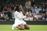 Serena Williams of the US celebrates after winning a point against France's Harmony Tan in a first round women's singles match on day two of the Wimbledon tennis championships in London, Tuesday, June 28, 2022. (AP Photo/Alberto Pezzali)