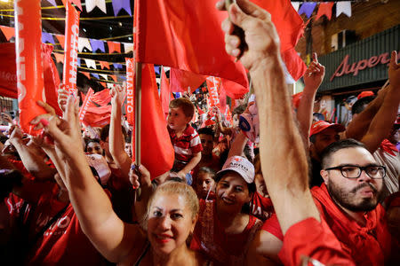 Supporters of Paraguay’s newly-elected President Mario Abdo Benitez of the Colorado Party celebrate in Asuncion, Paraguay April 22, 2018. REUTERS/Mario Valdez